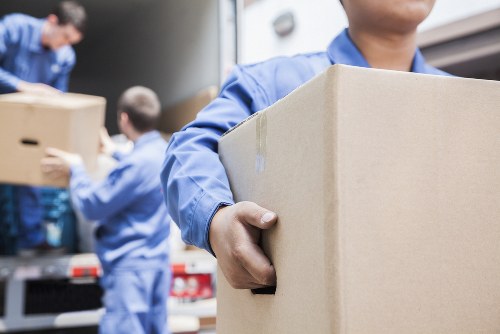 Local movers handling a Brixton residential move on a South London street