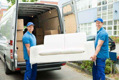 Removal van and moving team preparing a Brixton flat move