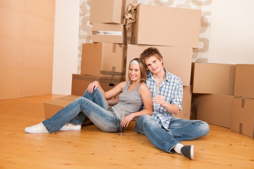 Movers using protective equipment during a carefully managed home removal