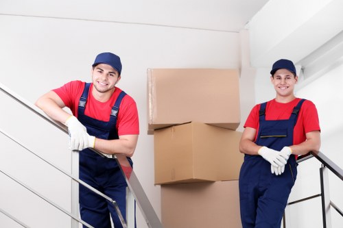 Customer complaint being reviewed in a professional removals service setting