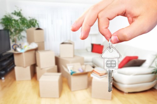 Removal van and moving crew preparing for a Brixton home move