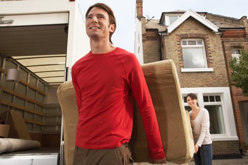 Removal van loading in Brixton on a local residential street