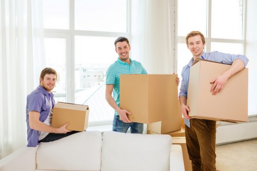 Office relocation team handling desks and equipment in Brixton