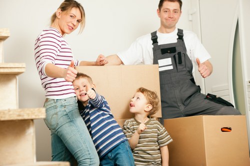 Removal workers following safe procedures during a move